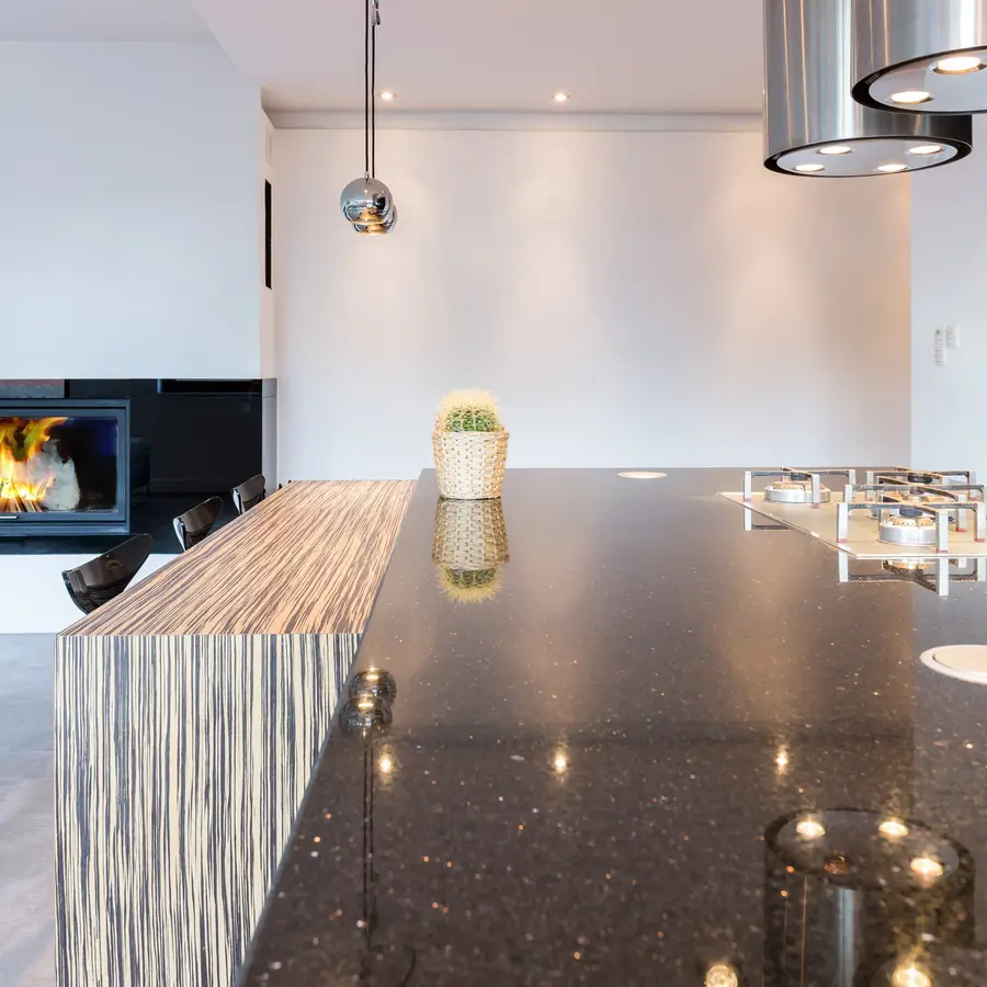Renovated interior of a Somerville, MA triple-decker with refinished floors and updated lighting
